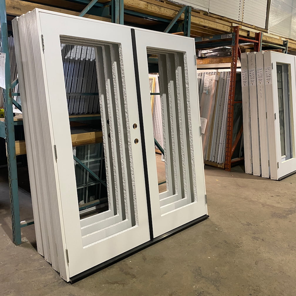 Exterior entry doors with glass sidelites at MRNU